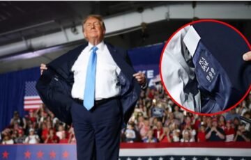 Trumpo kostiumo etiketė sukėlė audrą: kodėl jis vilkėjo, kaip teigiama, importuotą drabužį?
